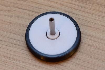 Kolečko a distanční podložka na osičce