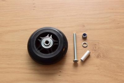 Náhradní kolečko na kufr a osička
