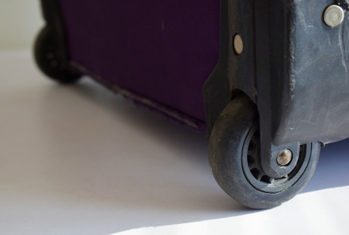 Kufr s pevnými kolečky